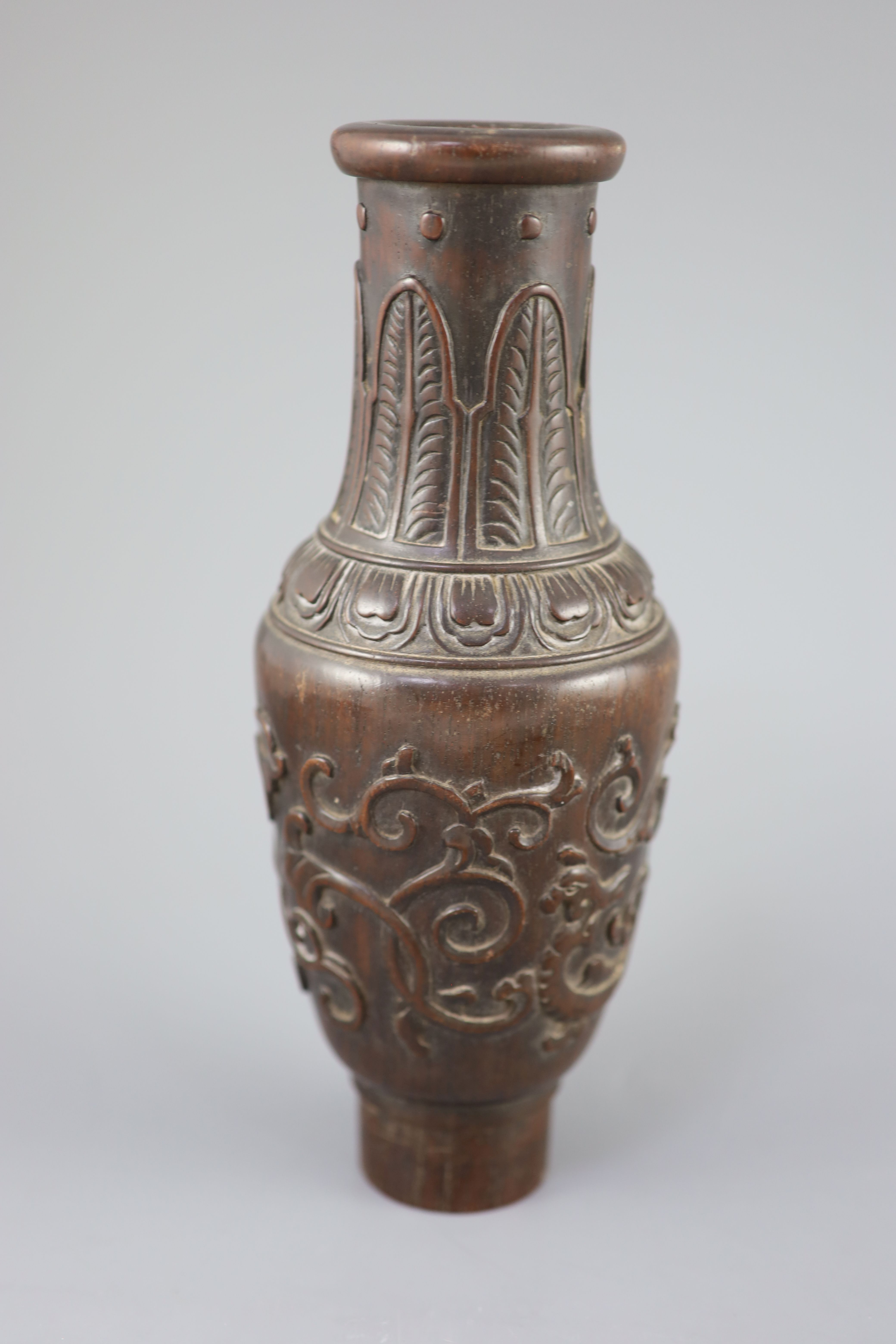 A Chinese hongmu model of a vase and a Chinese boxwood dragon handle, 18th century,